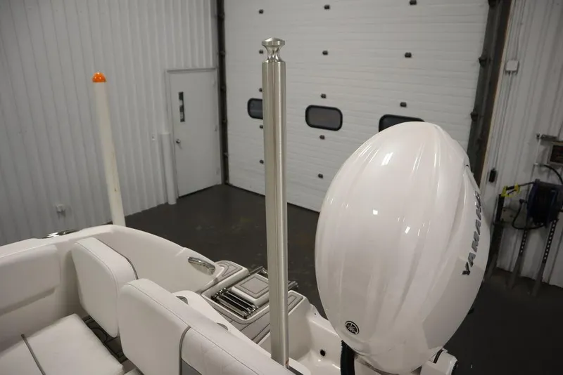 Slide: The Image of 2025 Sea Fox 228 Traveler boat interior with Yamaha engine in a garage. - 38