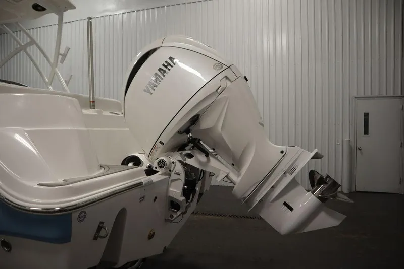 Slide: The Image of 2025 Sea Fox 228 Traveler with Yamaha outboard motor in a garage. - 41