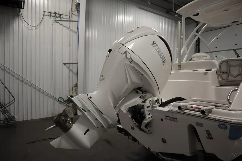 Slide: The Image of 2025 Sea Fox 228 Traveler with Yamaha outboard motor in a garage. - 43