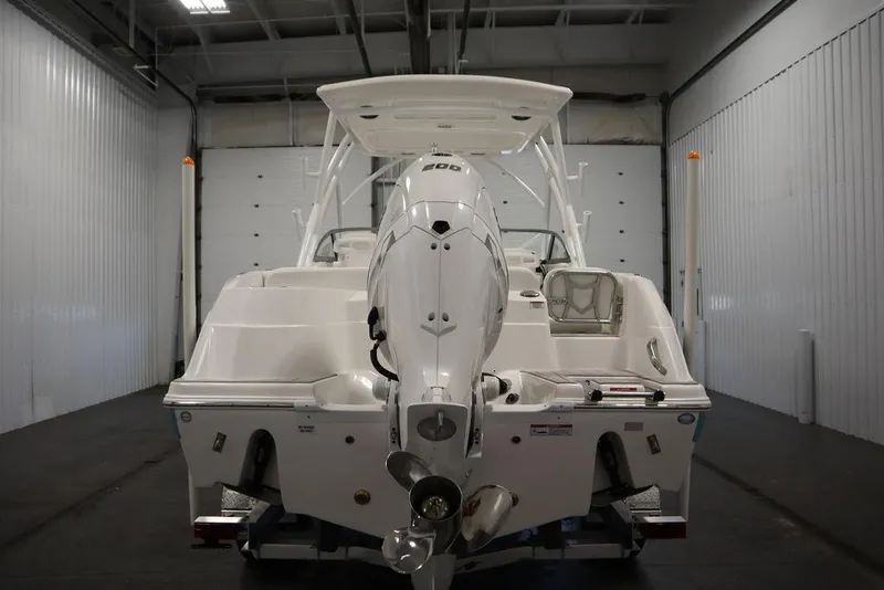 Slide: The Image of 2025 Sea Fox 228 Traveler boat in a storage facility, rear view. - 6