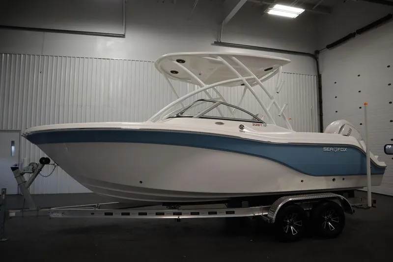 Slide: The Image of 2025 Sea Fox 228 Traveler boat on trailer in indoor storage. - 7