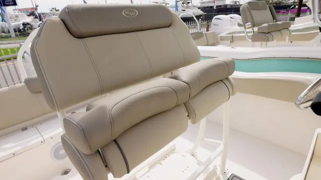Slide: The Image of 2024 Key West 219 FS boat with beige cushioned seating. - 8