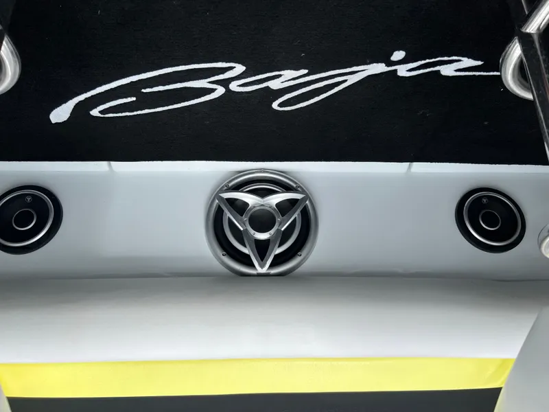 Slide: The Image of 2005 Baja Outlaw boat with sleek design and audio system. - 35