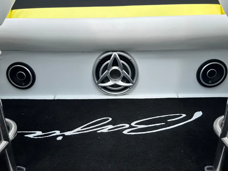 Slide: The Image of 2005 Baja Outlaw boat interior with speakers and branded carpet. - 36