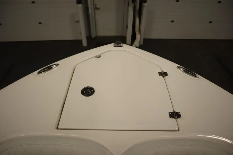 Slide: The Image of Bow of 2025 Sea Fox 228 Commander boat with storage hatch. - 12