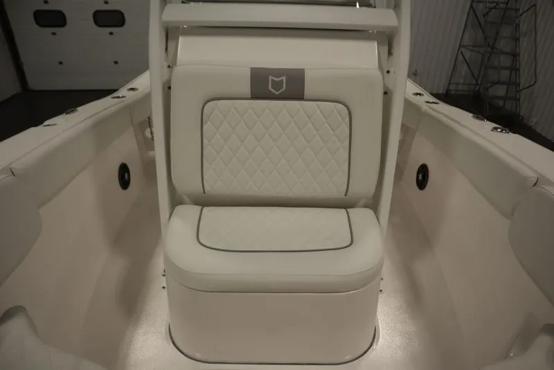 Slide: The Image of 2025 Sea Fox 228 Commander boat interior with cushioned seating. - 18