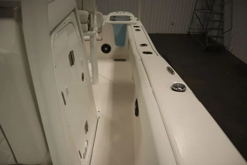 Slide: The Image of 2025 Sea Fox 228 Commander boat interior with storage compartments and seating. - 19