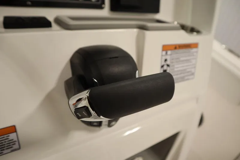 Slide: The Image of Close-up of 2025 Sea Fox 228 Commander throttle control. - 28