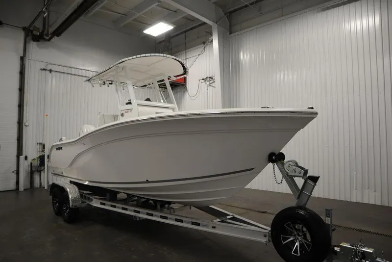 Slide: The Image of 2025 Sea Fox 228 Commander boat on trailer in indoor storage. - 3