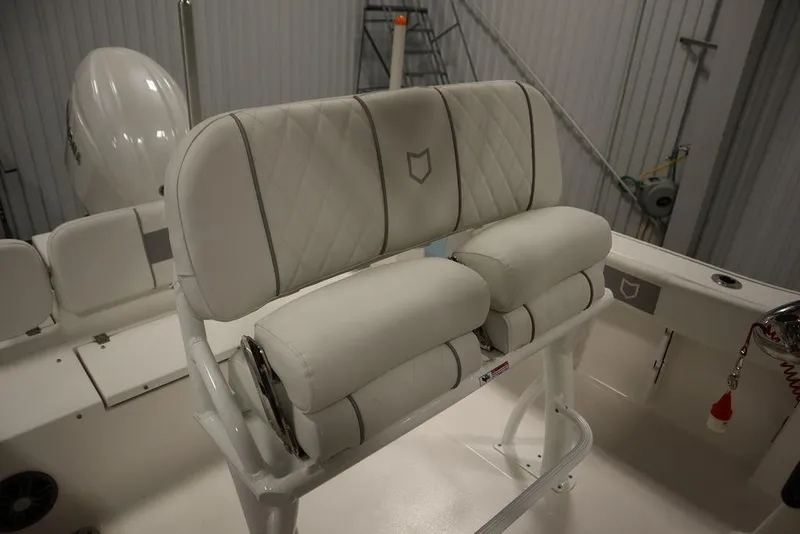 Slide: The Image of 2025 Sea Fox 228 Commander boat interior with cushioned seating. - 32