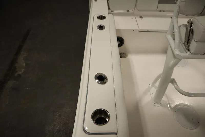 Slide: The Image of 2025 Sea Fox 228 Commander boat interior with rod holders and seating. - 33