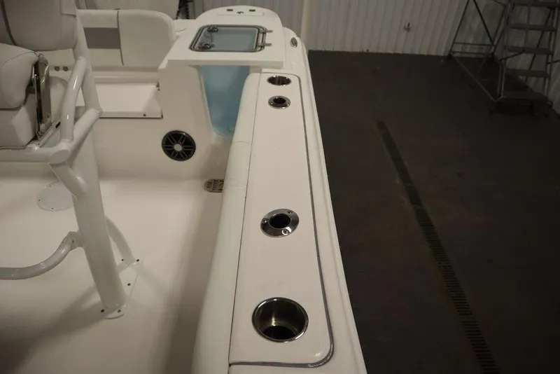 Slide: The Image of 2025 Sea Fox 228 Commander boat interior with rod holders and seating. - 34