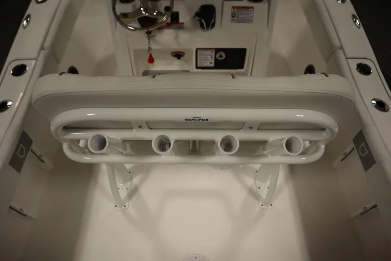 Slide: The Image of 2025 Sea Fox 228 Commander boat interior with rod holders and steering console. - 37