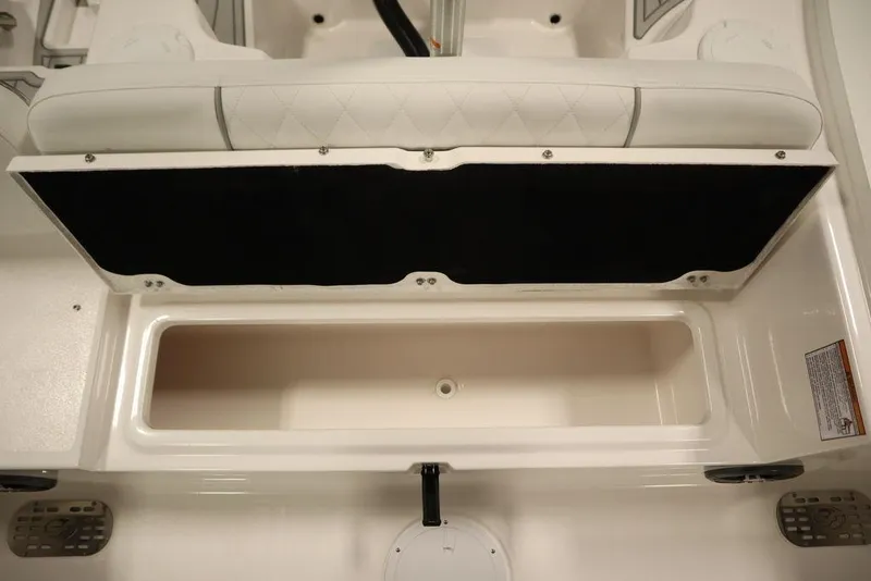 Slide: The Image of 2025 Sea Fox 228 Commander boat storage compartment, open and empty. - 40