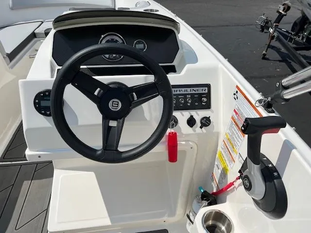Slide: The Image of 2022 Bayliner Element M17 dashboard with steering wheel and control panel. - 5