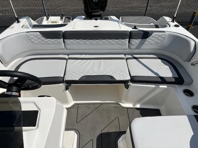 Slide: The Image of 2022 Bayliner Element M17 boat interior with spacious seating and modern design. - 8