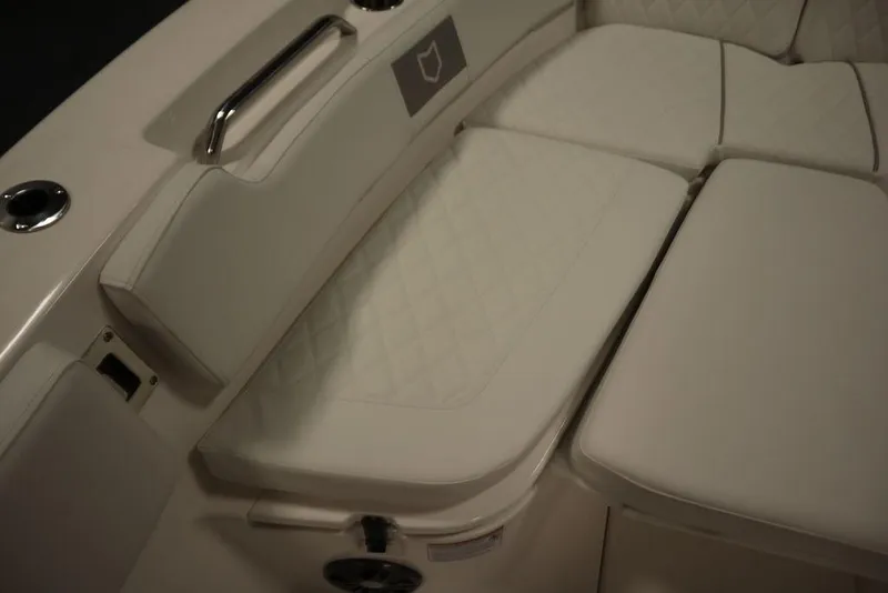 Slide: The Image of 2025 Sea Fox 248 Commander boat interior seating with quilted upholstery. - 14