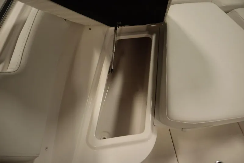 Slide: The Image of 2025 Sea Fox 248 Commander storage compartment with cushioned seating. - 15