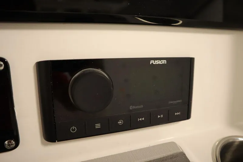 Slide: The Image of Fusion audio system on 2025 Sea Fox 248 Commander boat dashboard. - 28
