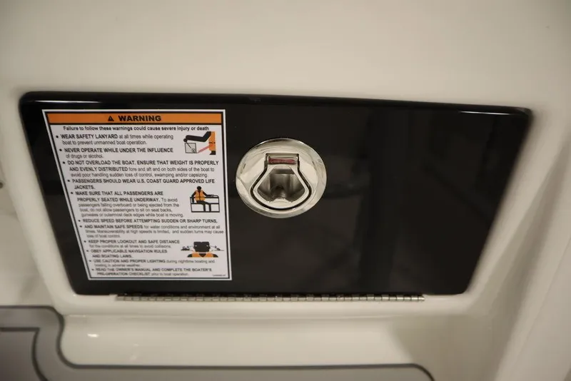 Slide: The Image of Warning label and latch on 2025 Sea Fox 248 Commander boat. - 31