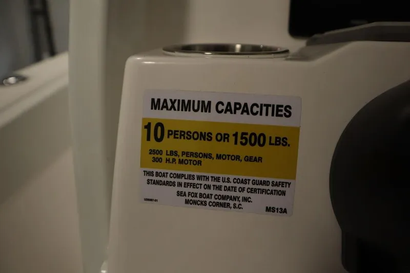 Slide: The Image of 2025 Sea Fox 248 Commander capacity label: 10 persons or 1500 lbs, 300 HP motor. - 37