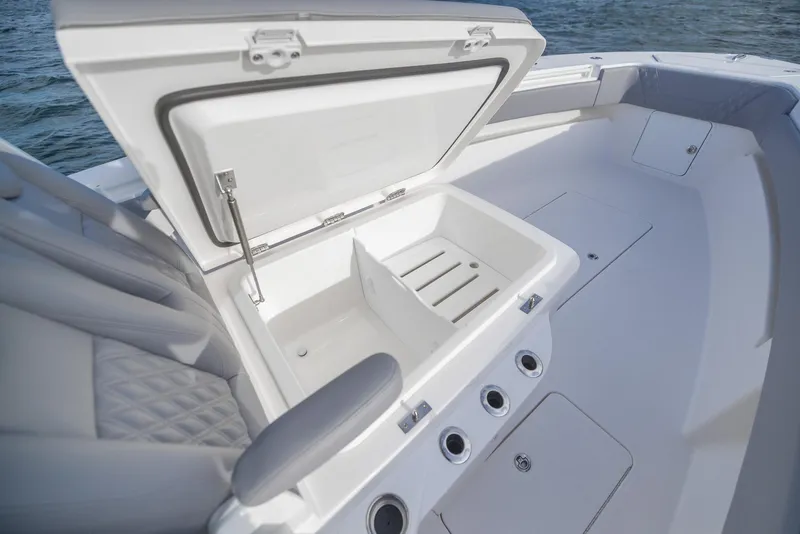 Slide: The Image of 2025 Invincible 33 Open Fisherman boat with open storage compartment. - 13