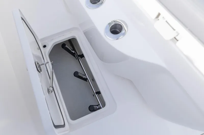 Slide: The Image of Open storage compartment on 2025 Invincible 33 Open Fisherman boat. - 14