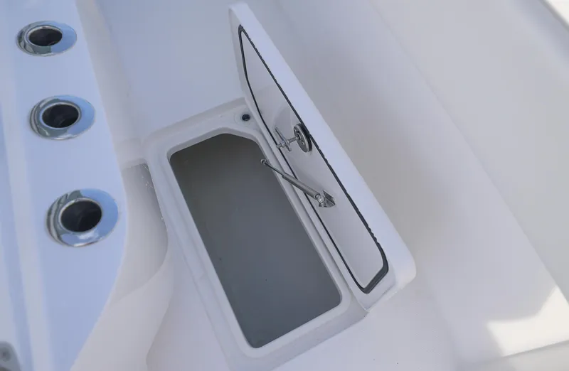 Slide: The Image of Open storage compartment on 2025 Invincible 33 Open Fisherman boat. - 15