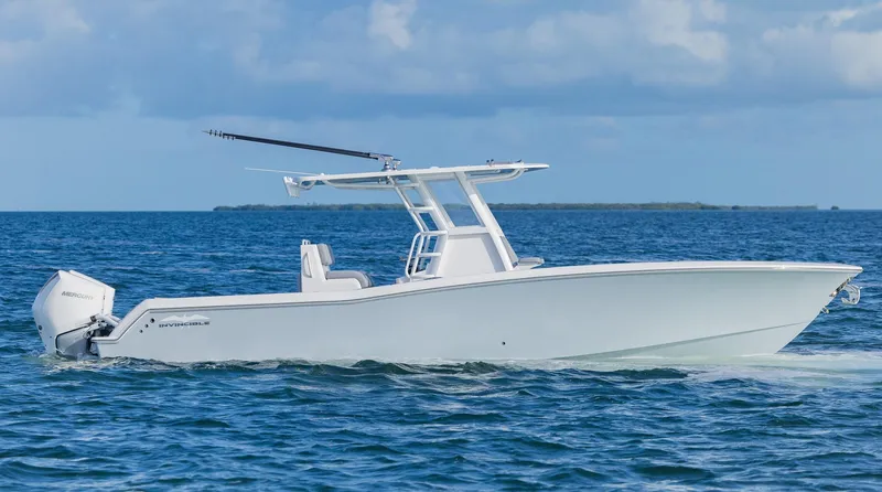 Slide: The Image of 2025 Invincible 33 Open Fisherman boat cruising on the ocean. - 2