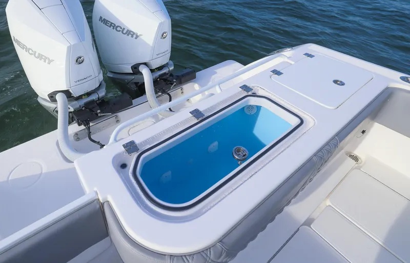 Slide: The Image of 2025 Invincible 33 Open Fisherman boat with dual Mercury engines and livewell. - 30