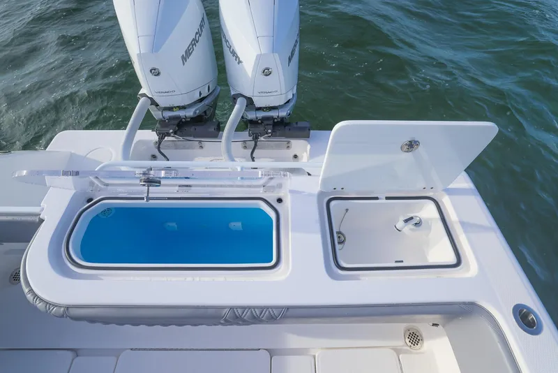 Slide: The Image of 2025 Invincible 33 Open Fisherman boat with dual Mercury engines and livewell. - 31