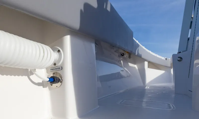 Slide: The Image of 2025 Invincible 33 Open Fisherman boat interior, featuring sleek white design and modern fittings. - 33