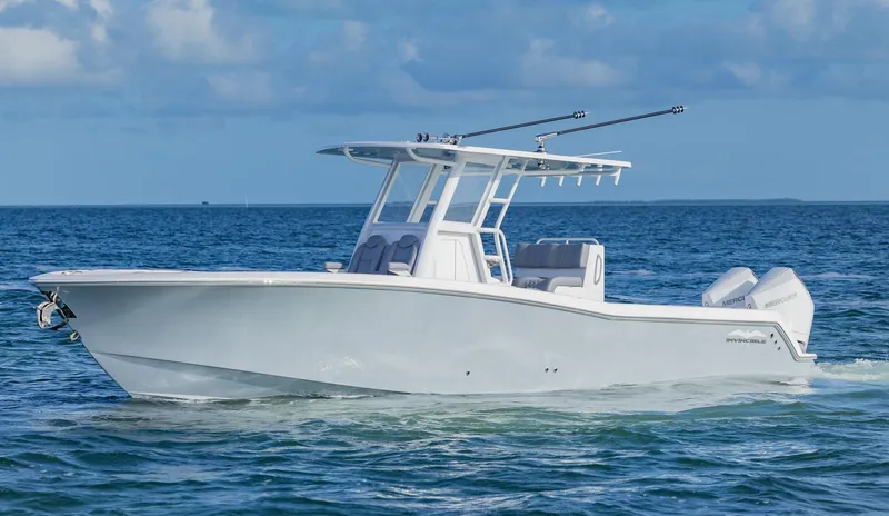 Slide: The Image of 2025 Invincible 33 Open Fisherman boat cruising on the ocean. - 39