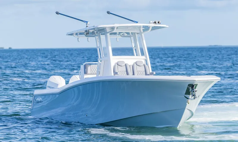 Slide: The Image of 2025 Invincible 33 Open Fisherman boat cruising on the ocean. - 40