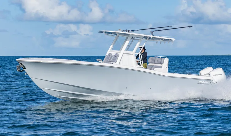 Slide: The Image of 2025 Invincible 33 Open Fisherman boat cruising on open water. - 41