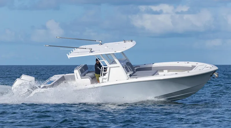Slide: The Image of 2025 Invincible 33 Open Fisherman boat cruising on open water. - 48