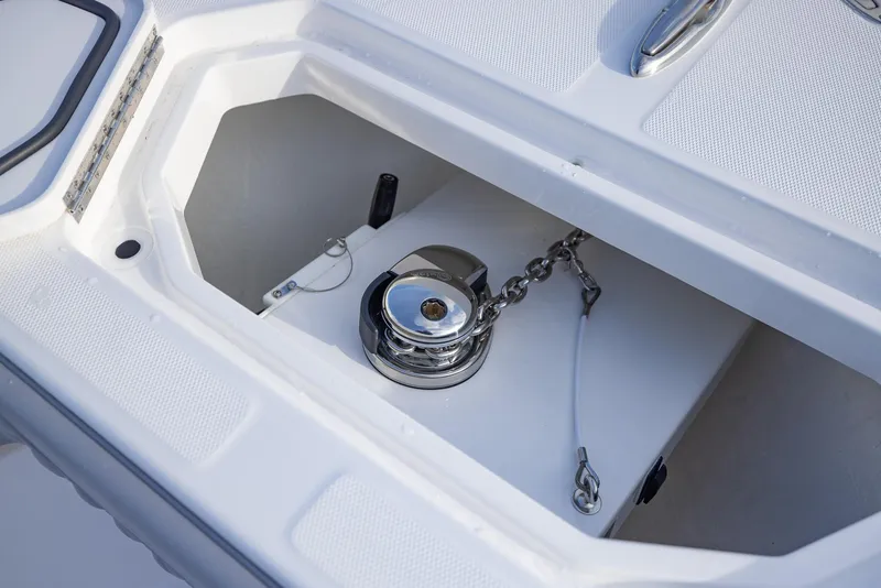 Slide: The Image of Anchor compartment of 2025 Invincible 33 Open Fisherman boat. - 9