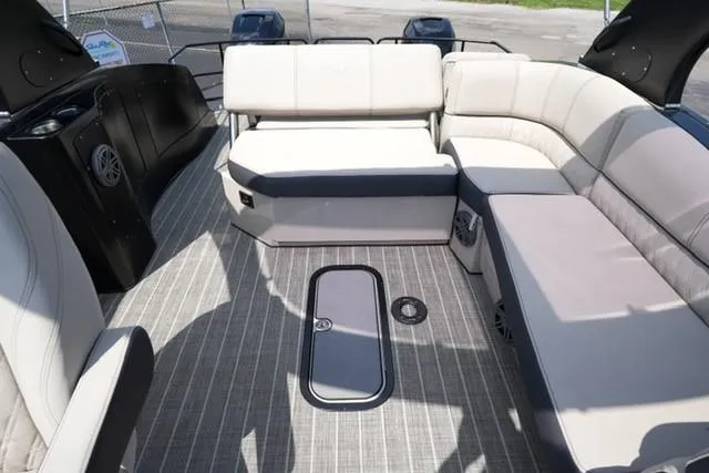 Slide: The Image of 2019 Harris Crowne 270 SL Twin Engine interior with luxurious seating and modern design. - 12