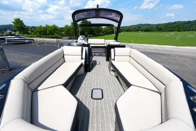 Slide: The Image of 2019 Harris Crowne 270 SL Twin Engine boat with spacious seating and sleek design. - 6