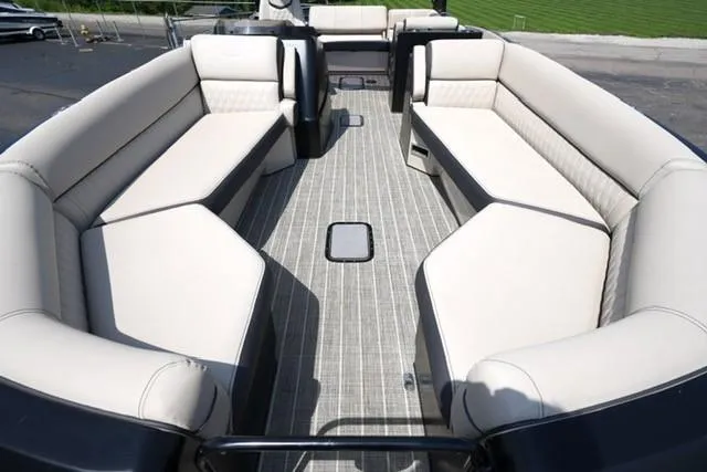 Slide: The Image of Luxurious seating on 2019 Harris Crowne 270 SL Twin Engine pontoon boat. - 7