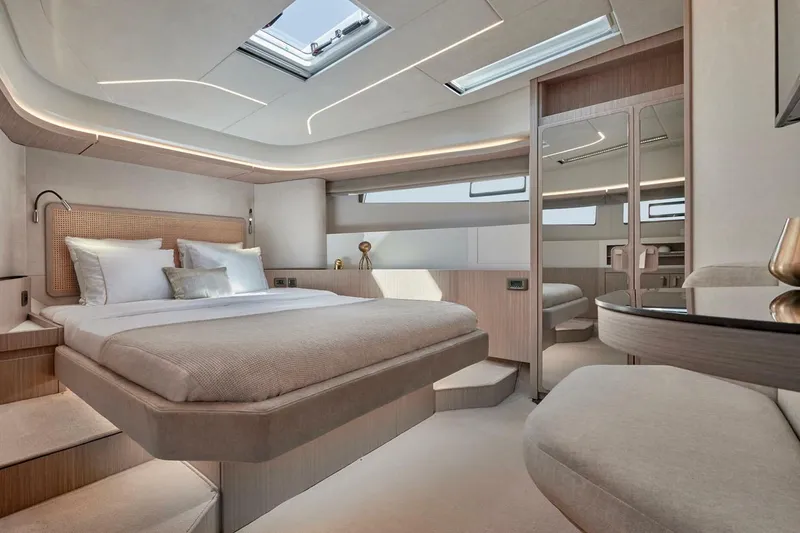 Slide: The Image of Luxurious 2025 Prestige F4.9 yacht interior with helm, seating, and marina view. - 10