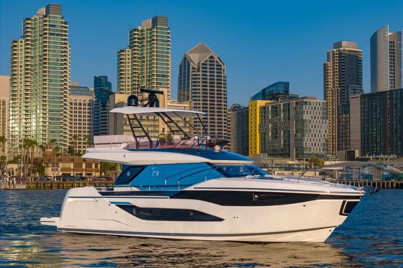 Slide: The Image of Luxurious 2025 Prestige F4.9 yacht deck with elegant seating and waterfront view. - 14