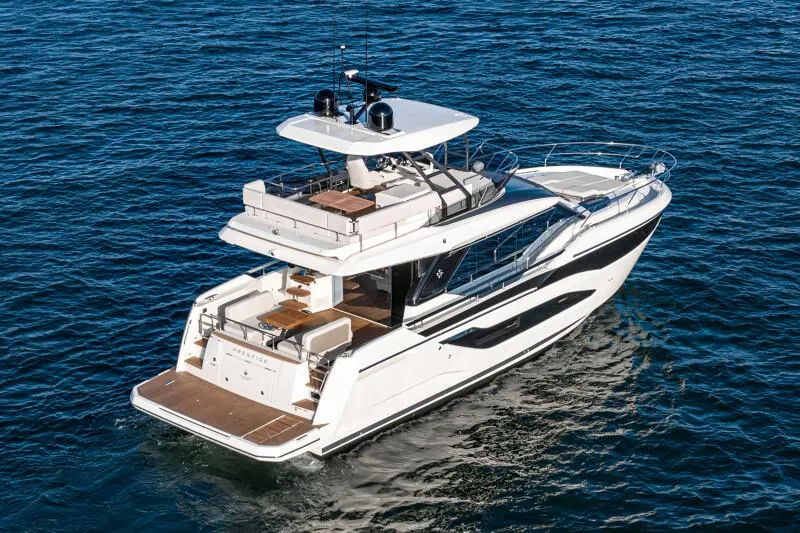 Slide: The Image of Compact bathroom in 2025 Prestige F4.9 yacht with modern fixtures and wooden accents. - 21