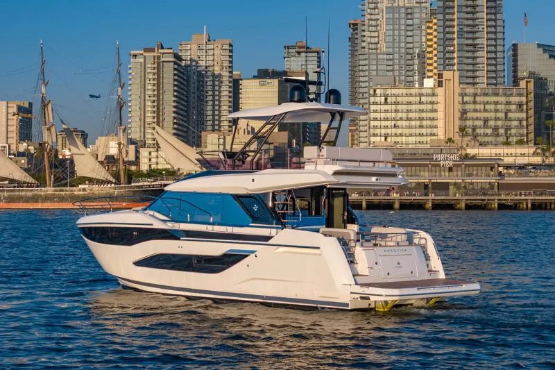 Slide: The Image of Luxurious interior of 2025 Prestige F4.9 yacht with modern helm and seating area. - 34