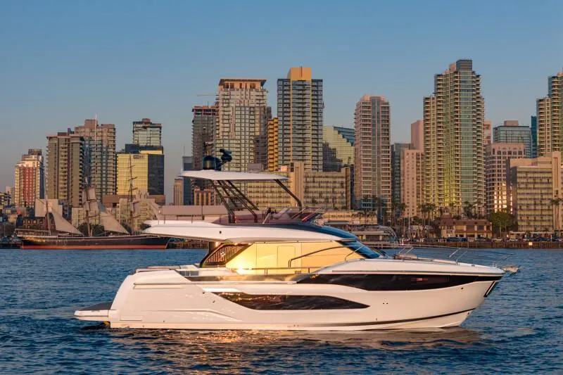 Slide: The Image of Luxurious interior of 2025 Prestige F4.9 yacht with plush seating and modern helm. - 37