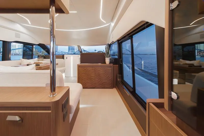 Slide: The Image of Aerial view of 2025 Prestige F4.9 yacht cruising on dark water. - 54