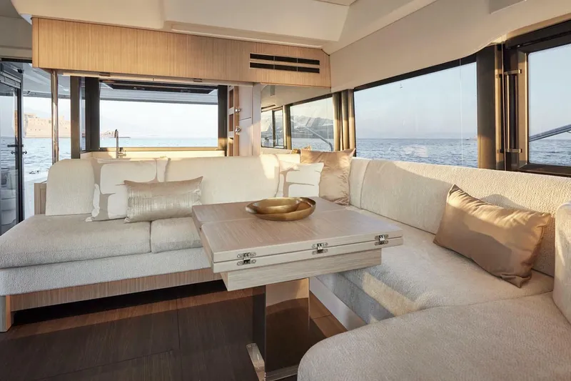 Slide: The Image of Prestige F4.9 yacht, 2025 model, docked with sun loungers, modern urban backdrop. - 8