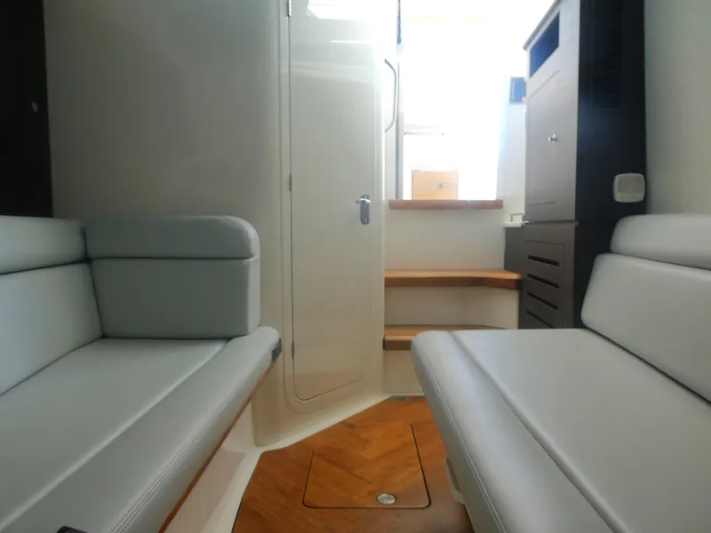 Slide: The Image of Interior of 2024 Boston Whaler 350 Realm, featuring sleek seating and modern design. - 20