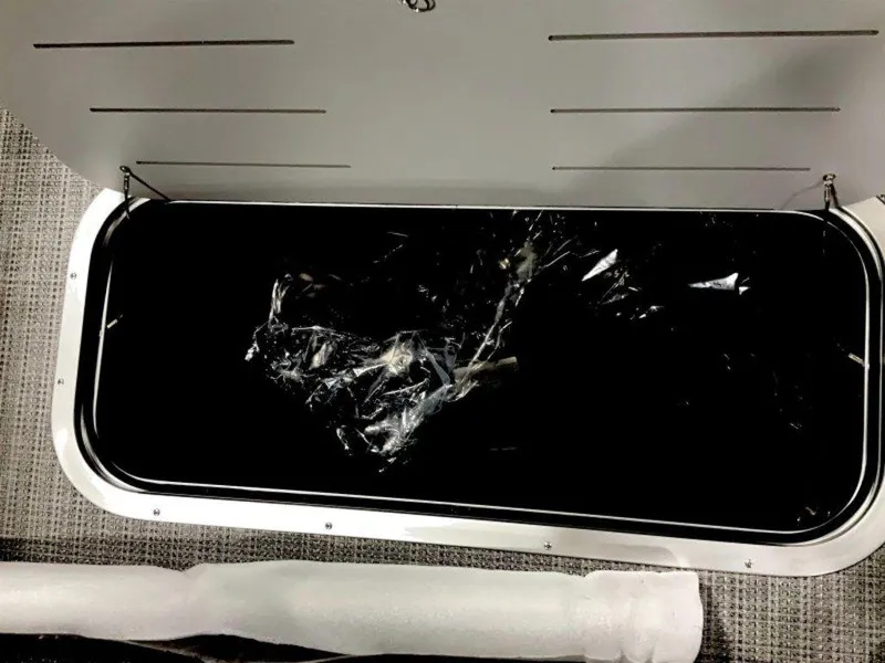 Slide: The Image of Open storage compartment in 2024 Bennington 25 RSR boat, featuring sleek interior design. - 17