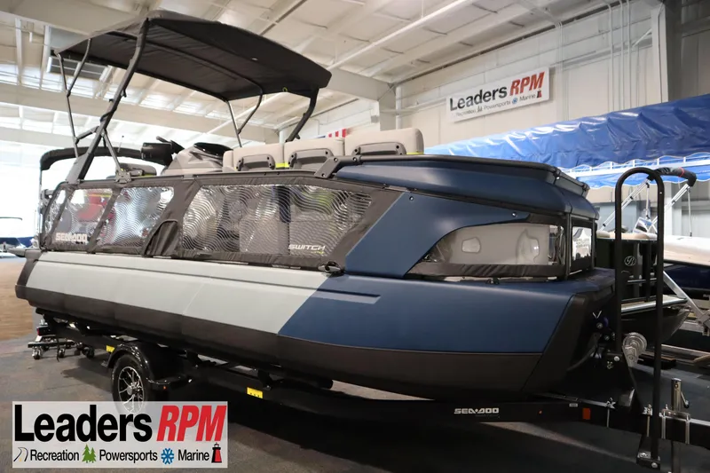 The Image of 2025 Sea-Doo Switch Cruise Limited 21 pontoon boat displayed indoors at Leaders RPM showroom. - 0